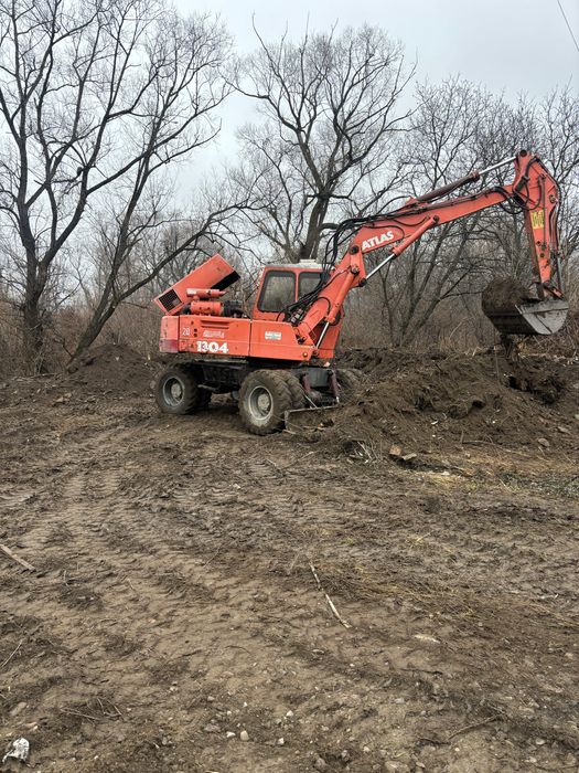 Послуги ескаваторів -міні і великих колісних
