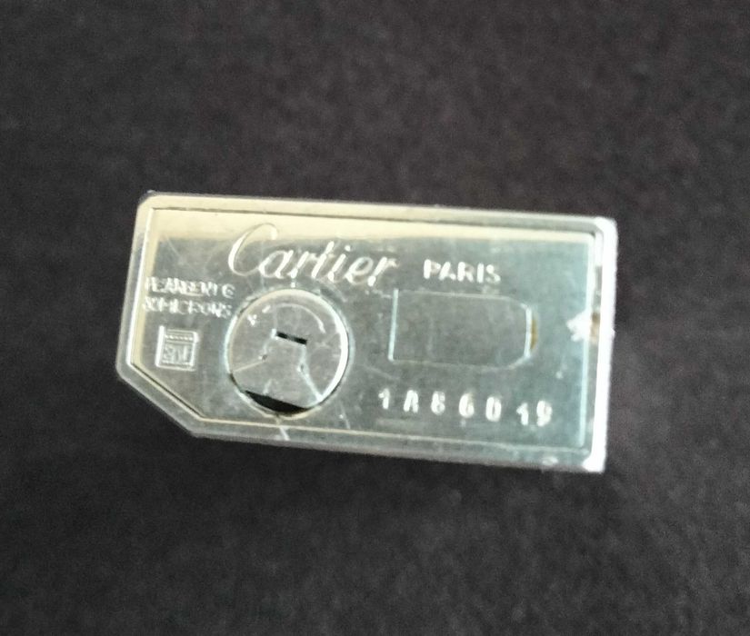 Isqueiros dos anos 70 Cartier Le Must e Cartier Santos