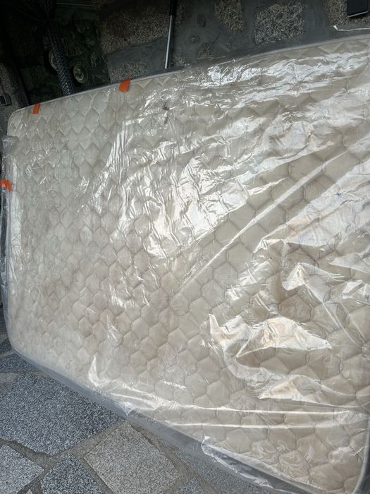 Colchao novo ainda no plastico