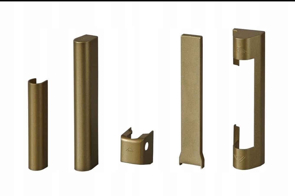 Osłonki na zawiasy Roto kolor złoty