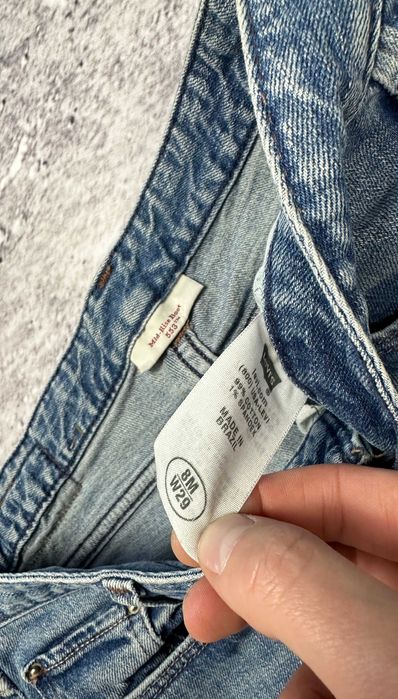 Spodnie jeansowe LEVIS 553 Mid-Rise Boot dzwony damskie szerokie W29