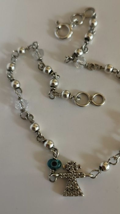 Pulseira em prata menina e olho gordo