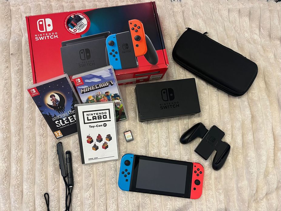 Nintendo Switch + pudełko + akcesoria + 4 gry