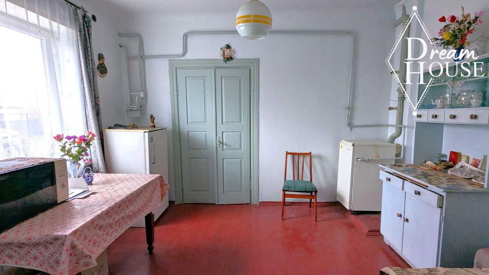 Продам половину будинку, по вул.Івана Багряного