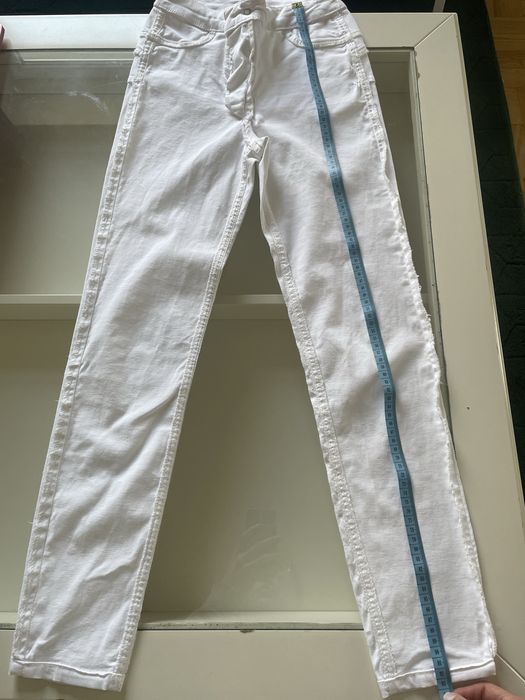 Spodnie białe jeansy skinny calzedonia r:S