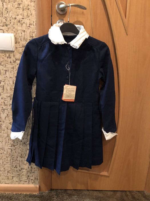 Шкільна форма на дівчинку синього кольору
