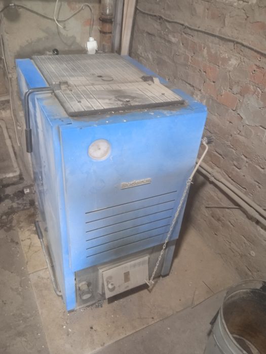 Котел твердопаливний Buderus