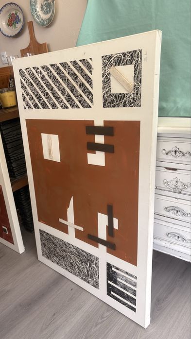 Conjunto de dois quadros abstratos com relevo