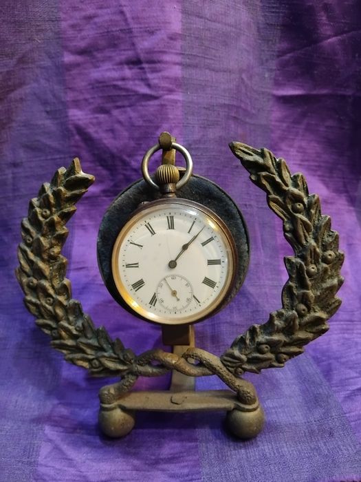 Expositor de relógios de bolso em bronze