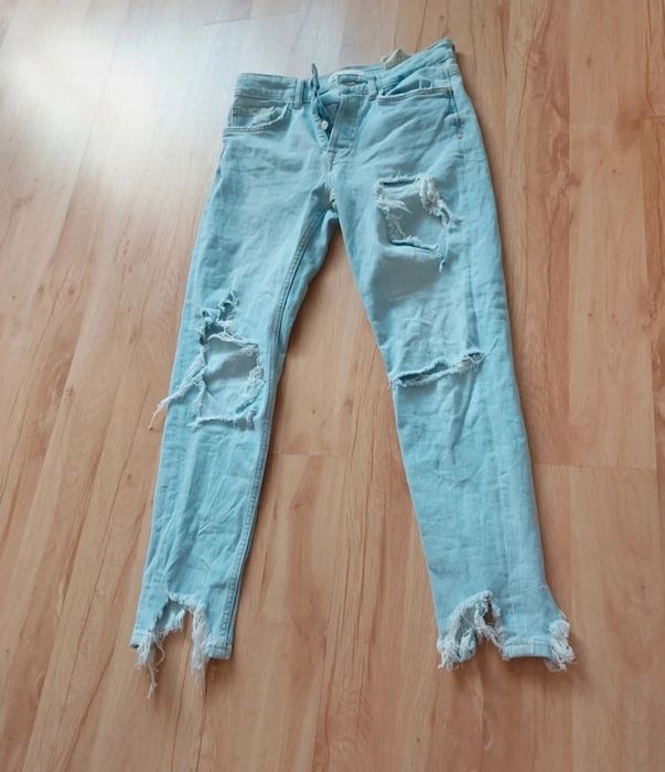 Spodnie jeansowe z dziurami Rozmiar 38 ZARA