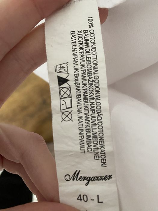 Біла сорочка з розрізом ззаду Розмір L, також добре підійде на