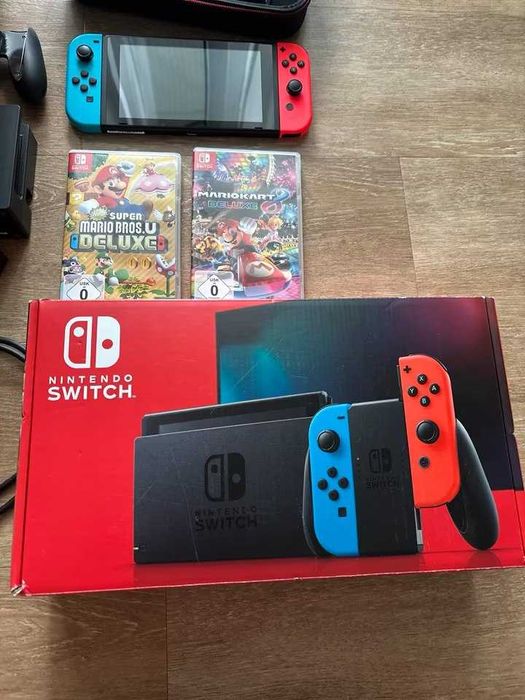 Nintendo Switch + Dock + 2 gry + etui | Stan bardzo dobry
