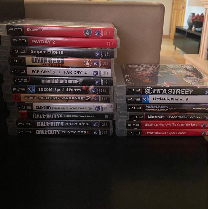 PS3 Slim + Games + 2 Controllers64740666477826121