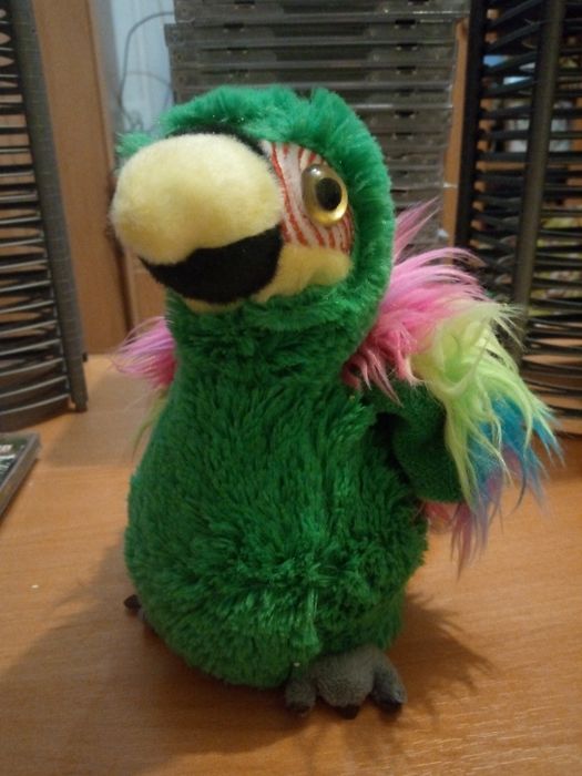 Говоряча папуга. Іграшка.