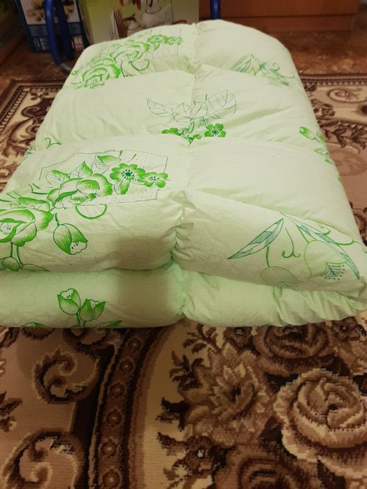 Пухова перина нова