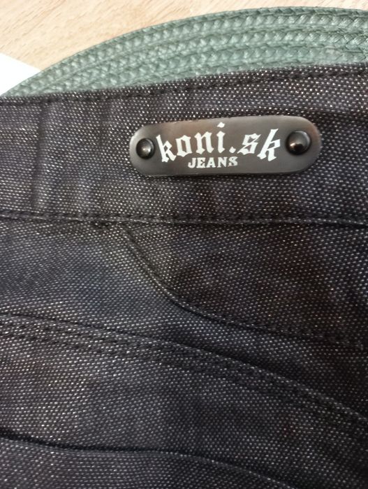 Spodnie damskie M srebrna nitka