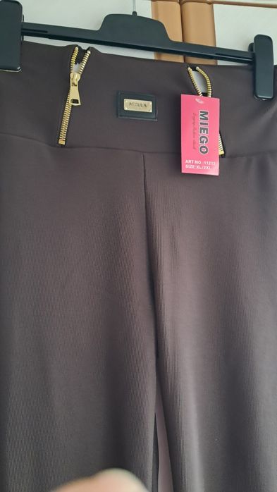 Nowe legginsy prazek firmy Fashion