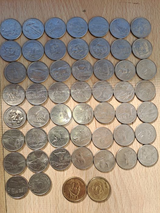 Коллекция из монет - четвертаков США