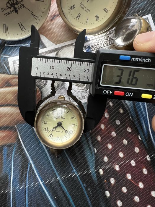 Вінтажні годинники Omega