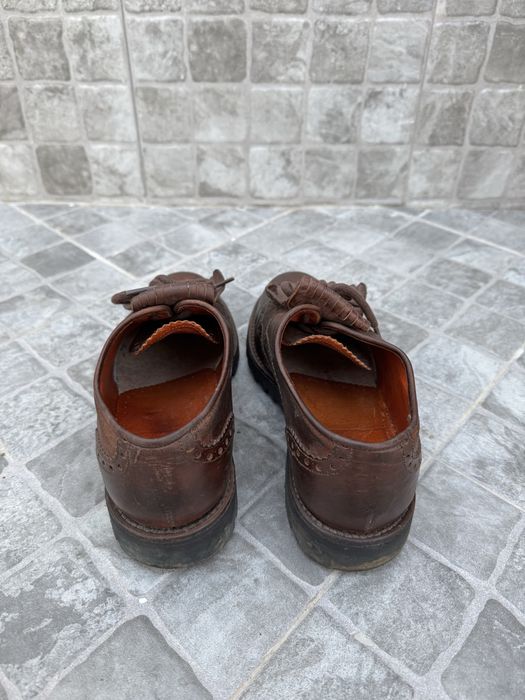 Sapatos de forcado em pele