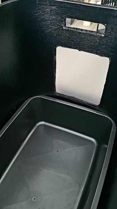 Designerska kuweta dla kota w formie mebla