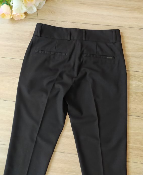Eleganckie spodnie w kant czarne 36 S do kostek