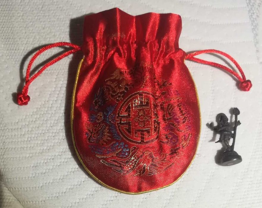 deus budista com quatro braços (saco original)