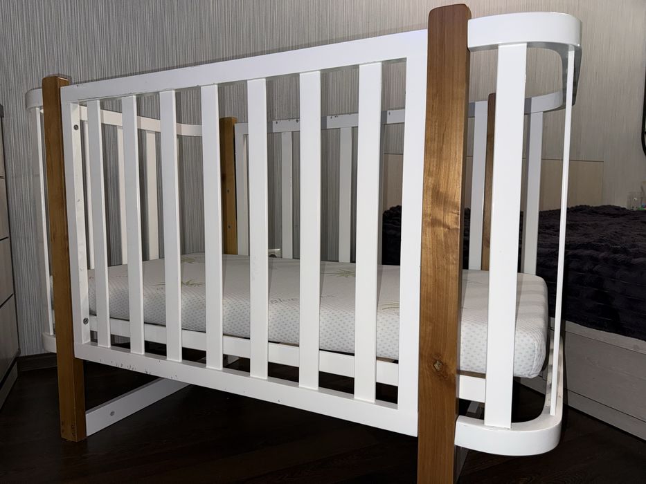 Дитяче дюліжечко на маятнику