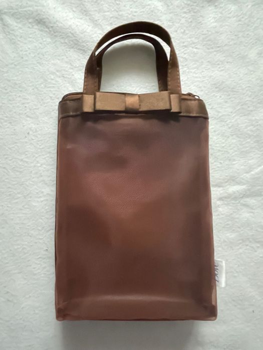 Brązowa, przeźroczysta kosmetyczka - dove