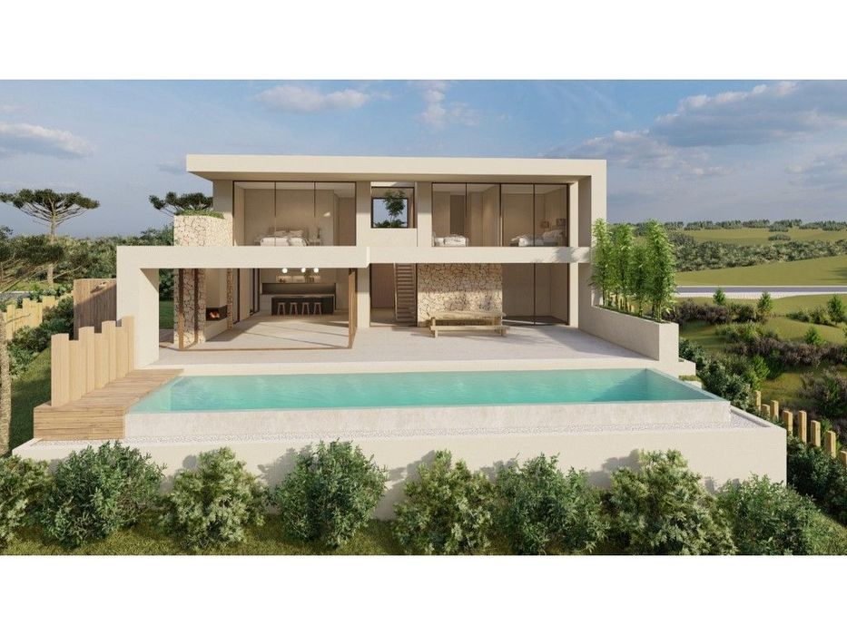Moradia de luxo inserida num Golfe Resort junto à praia e com vista...