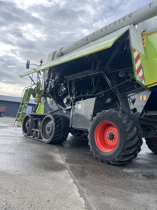 Claas Lexion 480 на гусеницях 2003 рік випуску