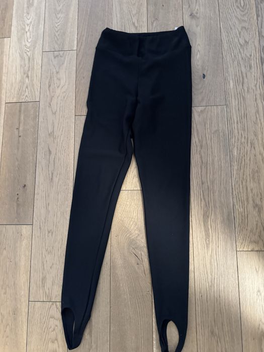 Czarne legginsy 4F