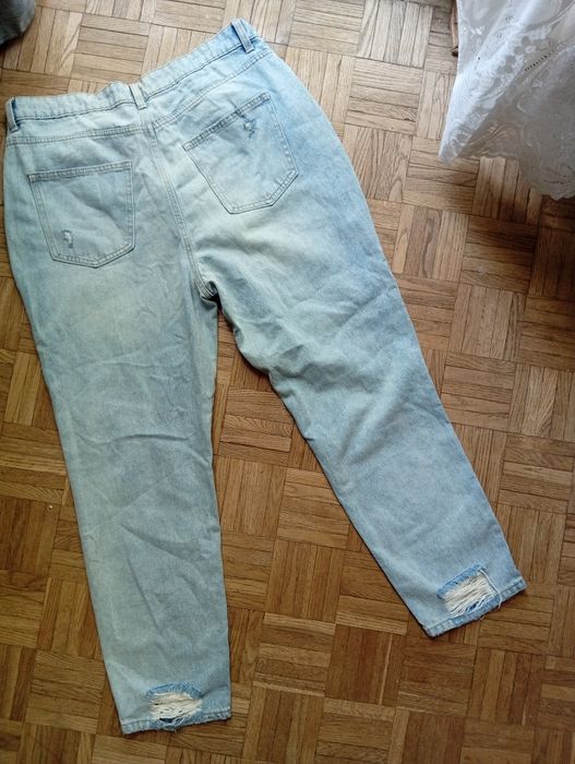 Jasnoniebieski jeansy z dziurami mom fit Primark 44