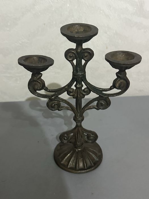Бронзовий трійний підсвічник