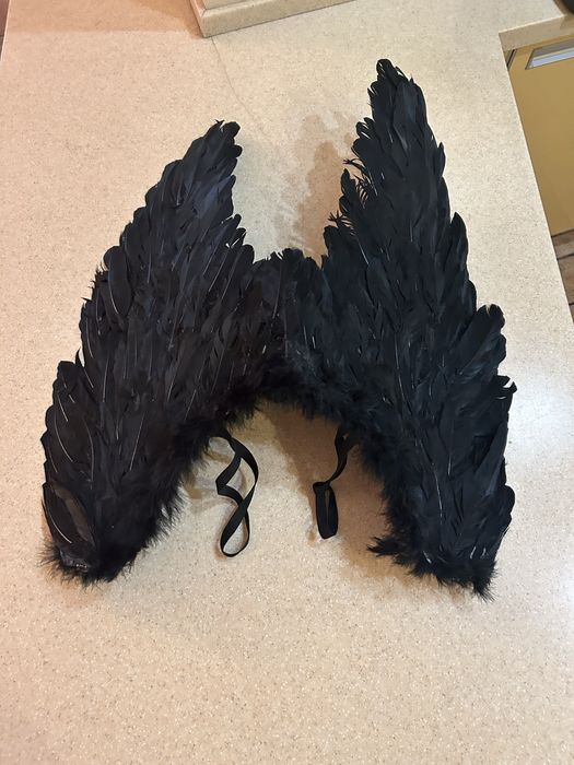 Черные крылья Ангела.