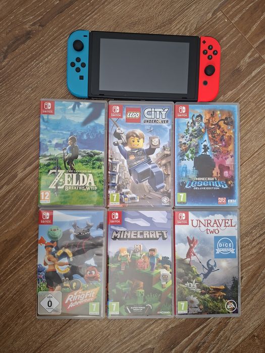 Nintendo Switch + 6 gier etui ring