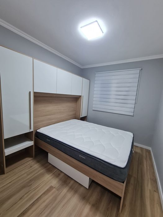 Quarto casal com arrumação