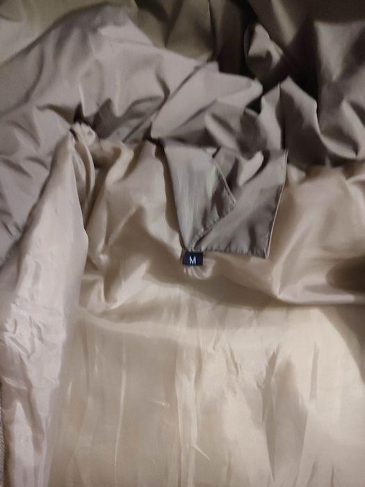 Зимовий довгий пуховик