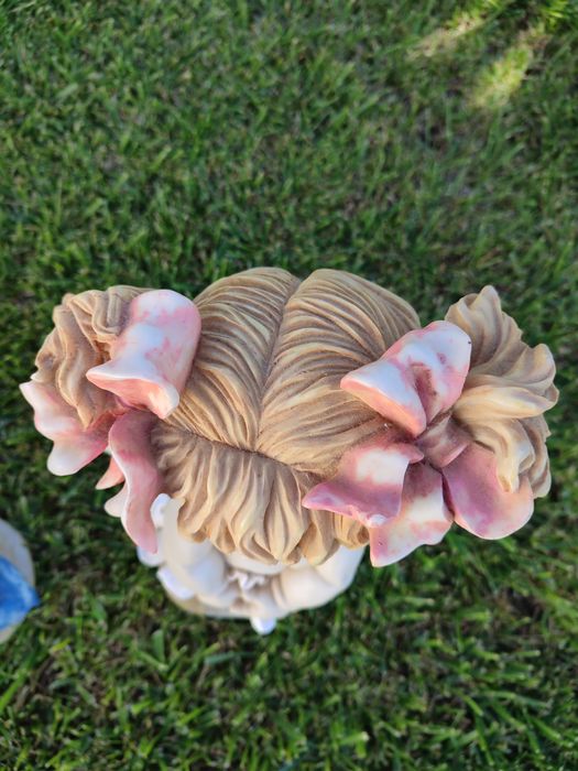 Casal de meninos em resina