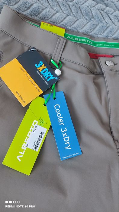 Nowe spodnie męskie do golfa rozmiar 48 Alberto