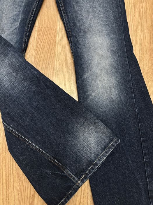 Мішкуваті розкльошені джинси “Bershka” з низькою посадкою