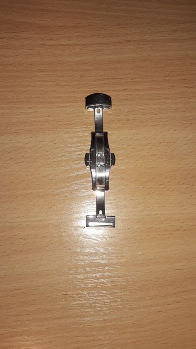 Пряжка метелик подвійна, бакля, кліпса.