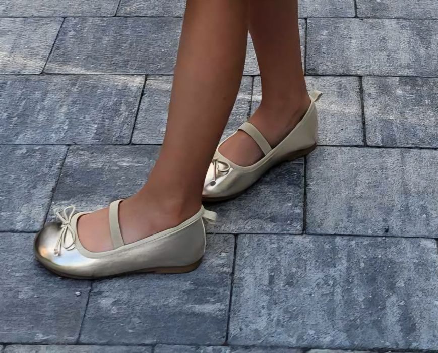 Buciki balerinki złote dla dziewczynki z kokardką na gumkę H&M