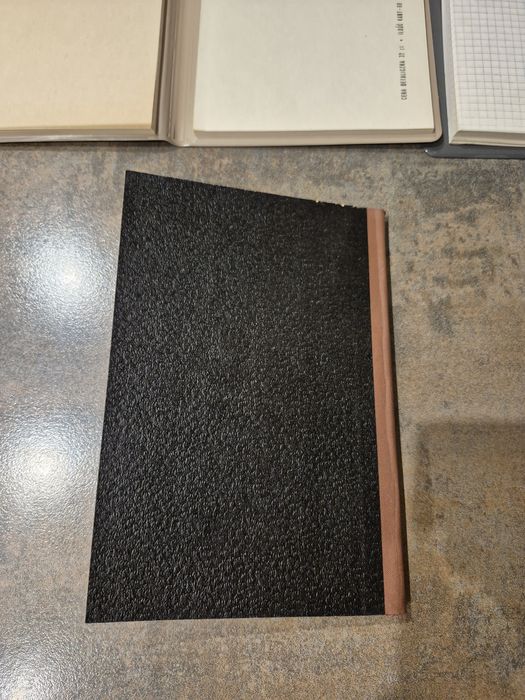 Zabytkowe zeszyty i notatnik PRL.