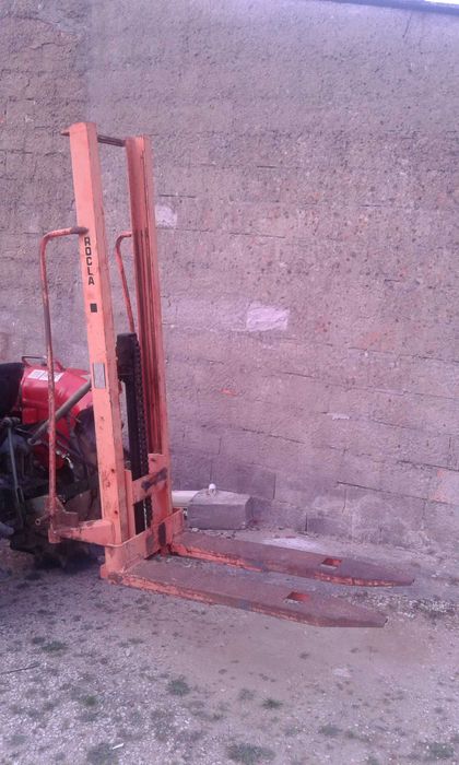 Torre de empilhador para trator