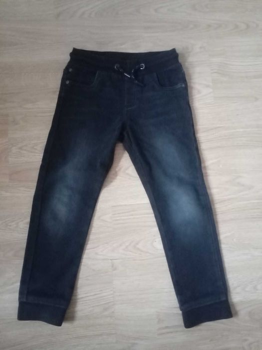 Jeansy miękkie na gumce 128cm czarne bdb