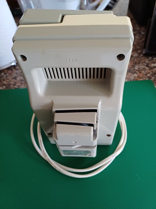 Abre latas elétrico