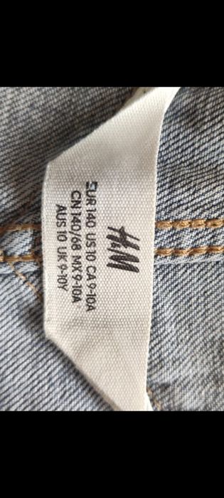 Spodnie dziecięce jeansowe ogrodniczki H&M  140