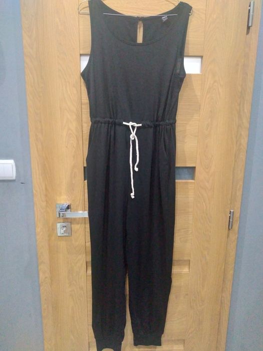 Fajny czarny kombinezon rozm M/XL biust 96/110cm