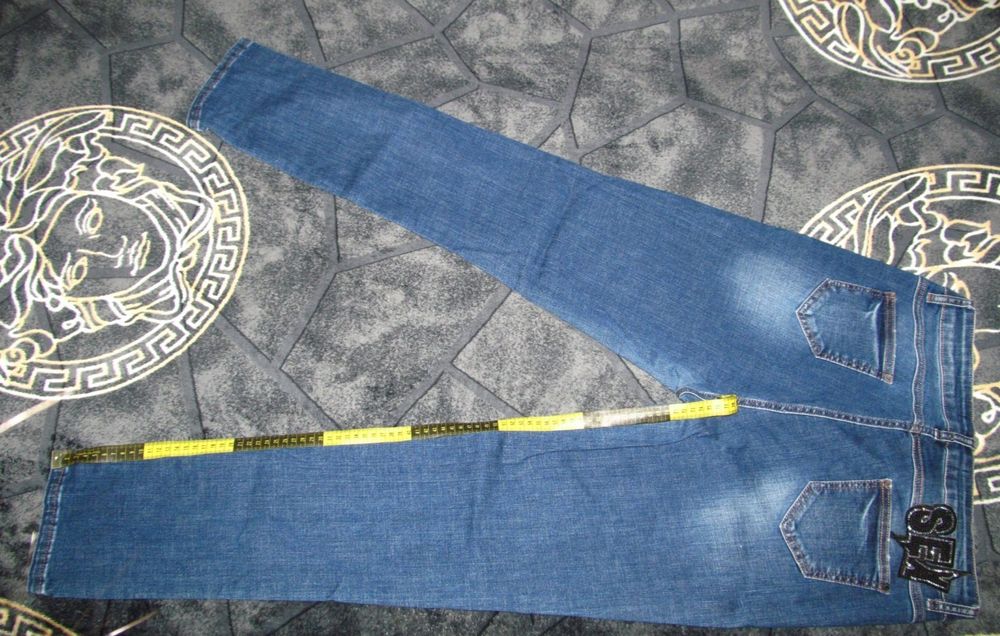 Темно-сині джинси